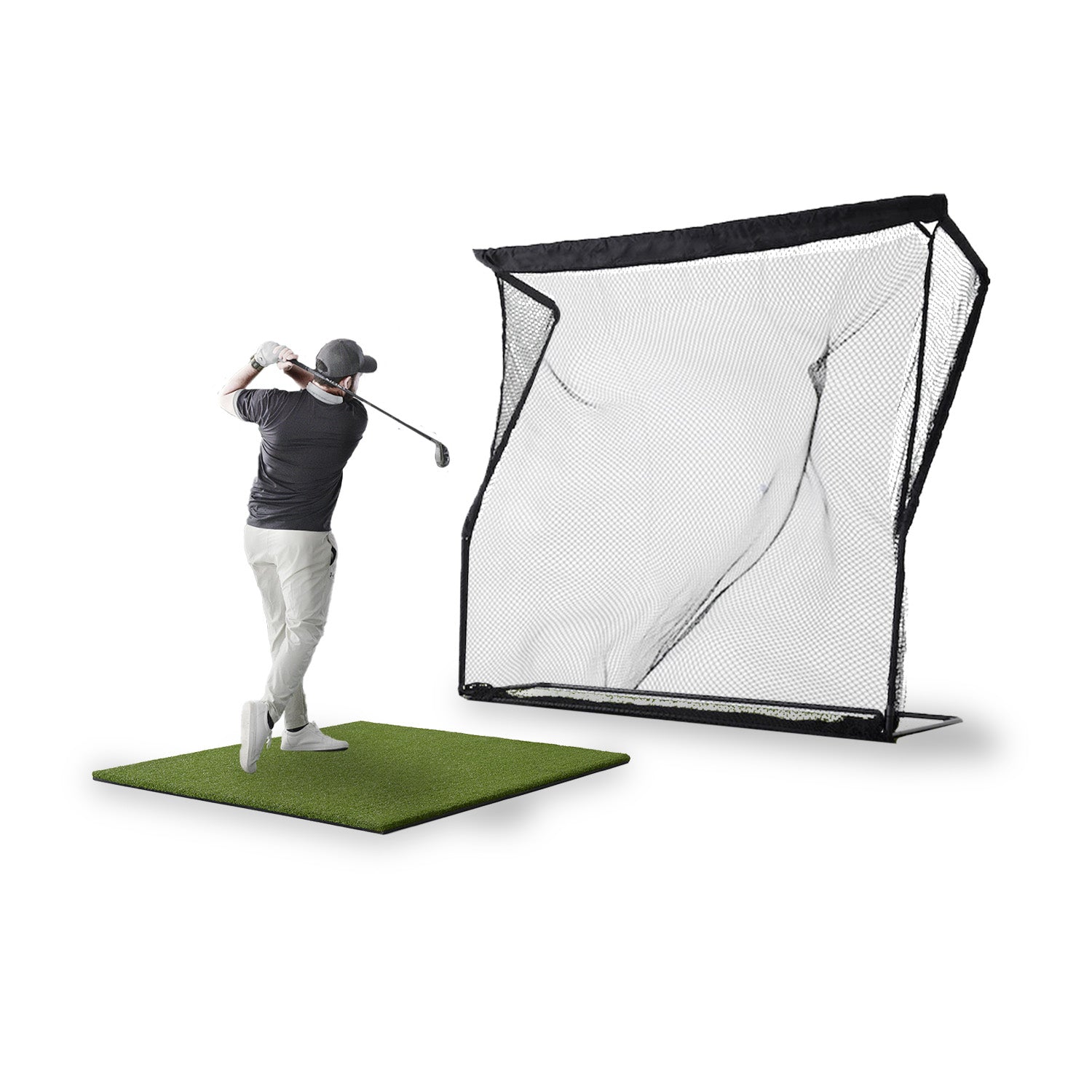 Man hitting on mat into golf return net accessory